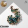 Brooch "Bird" Peacock, colored in yellow gold