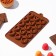 Form for chocolate of the share "Heart", silicone, 23.2 × 12 × 1 cm, 15 cells (d = 3.3 cm), brown color