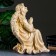 Figure "Angel on the knee" ivory, 58x48x38cm