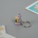 Polystone keychain "Snake with Christmas tree" mix 2x1.5x2.5 cm