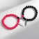 Bracelets "Demetrons" on a magnet, feather, black-pink color in silver