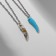 Kulons "Demetrons" Fangs are small, the color of beige-blue in silver, 45 cm