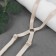 The straps of textile, cross -shaped, 1 cm, beige color