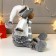 Interior doll "Losik in a white fur coat and cap" 34 cm
