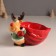 Ceramics stand "Elk in a green fur coat with a large red bag" 12.5x19.1x13.1 cm