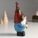 Suvenir Polystone "Santa Claus in a cap with berries, with a bird northern cardinal" 9x9x18.8 cm