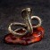 Souvenir "Snake of Cobra", large, brass, amber