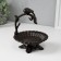 Souvenir cast iron stand "Bird on a branch above the flower" 17x15x13.5 cm