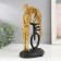 Polystone souvenir "Kiss, pair, monocycle and balloon" Gold 26x17x11 cm