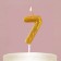 A candle for a cake, a number, brilliant “7”, gold, 4 x 10 cm.
