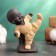 Figure "Buddha Karatist", 7x9 cm, yellow