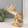 Souvenir Polystone "Elephant and 3 Elephants on the trunk. Indian patterns" Gold 19.8x10.3x21.5 cm