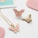 Set "Chosulka" 2 items: clips, pendant, spring butterflies, pink color in gold