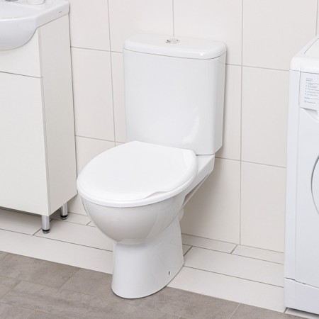 A toilet seat with a lid, snow-white color
