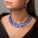 Set 2 objects: earrings, necklace "celebration" petals in 2 rows, white-blue color in silver, 40 cm
