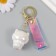 A keychain plastic, rubber with a carbine, a strap "Kitten with ice cream" 3.5x4.2 cm