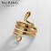 Ring Xuping Snake of Temptation, green color in gold, size 18