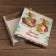 The box is folding, the lid is the "fun new year" 30 x 30 x 8 cm
