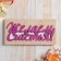 Wooden envelope carved "wish happiness" white background
