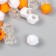Plastic beads "Crystal polyhedron. Orange, white, transparent" set 30 g 1x1x1 cm