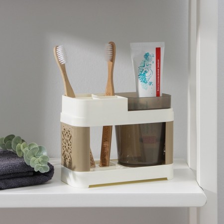 A stand for toothbrushes and paste with one glass, 15 × 7 × 12 cm, the color of coffee with milk