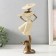 Polystone souvenir "Girl in a wide -brimmed hat" Sand with bronze 11x8.5x30 cm
