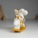 Suvenir Polystone "Santa Claus in a gold caftan on a cap-cap" 10.5x6x11.5 cm