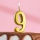 Candle in a cake on a skewer, number 9, gold, 4.5x2.5 cm