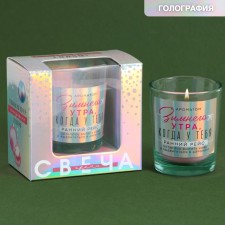 New Year's candle in a glass of 