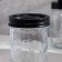 A set of bathroom accessories, 4 items (dispenser, glass for brushes, 2 jars), black color