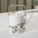 Ceramic tea set "Sakura", 6 items: 4 circles 250 ml, kettle 1 l, tray D = 29 cm, white color