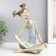 Souvenir Polystone "Baby with two tails" white-gold 21x13.5x26 cm