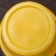 A glass of plastic disposable "pugs", 200 ml, yellow color