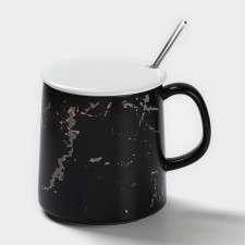Ceramic mug with a spoon 