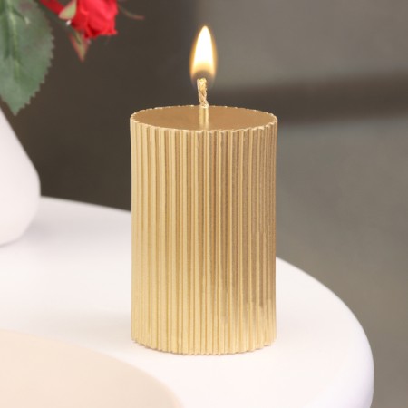 Candle-cylinder with faces, 5x7.5 cm, gold, 6 hours