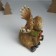 Souvenir Polystone "Losik Smile in a spruce wreath with a bow and bell" sits 13.5x11x16 cm 10325