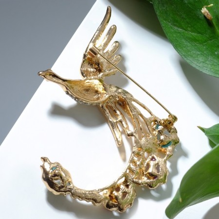 Brooch "Firebird with a magic tail", colored in gold-1
