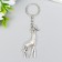Metal key "Giraffe" silver 5x2 cm