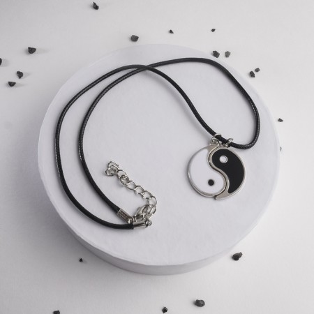 Yin-Yang pendant, black and white color in silver, on a black lace, 42 cm