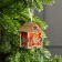Christmas tree toy "House with a bird", from batteries, glow warm white