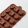 Form for chocolate of the share “circles, squares”, silicone, 21.5 × 10.4 × 1.5 cm, 15 cells, brown color