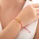Antistress Assortment Bracelet Unicorn, red color in gold, d = 6 cm