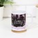 Putting mug of "Happiness in the New Year!" with application