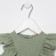 Body with ruffles crumb I am "Muslin", height 74-80 cm, green color