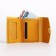Women's wallet on the button, yellow color