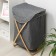 The basket is universal with a lid of the share "Lenon", 37 × 43 × 66 cm, the color is gray
