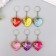 A plastic keychain for metal "heart with a bow" gold mix 3.7x3.7x1.2 cm