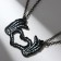 A pendant on a chain of "sin" 9 x 12.4 cm