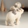 Souvenir Polystone "A child on a white bear" 13.5x6x12.5 cm