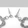Earrings with rhinestones "Heart" interweaving, white color in silver